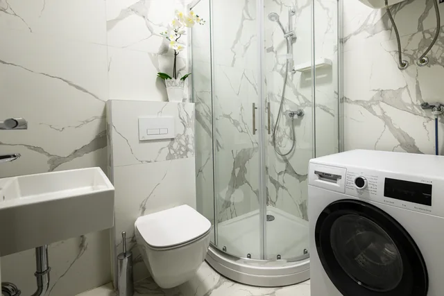 Washing machine, shower and washbasin in the second bathroom
