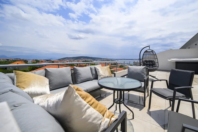 The Seget coastline beyond the penthouse terrace seating