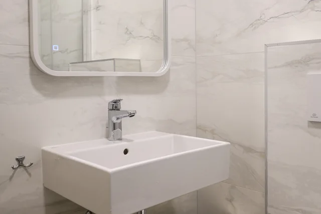 Bathroom washbasin and mirror