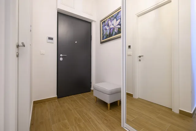 Entrance hall with mirrored storage