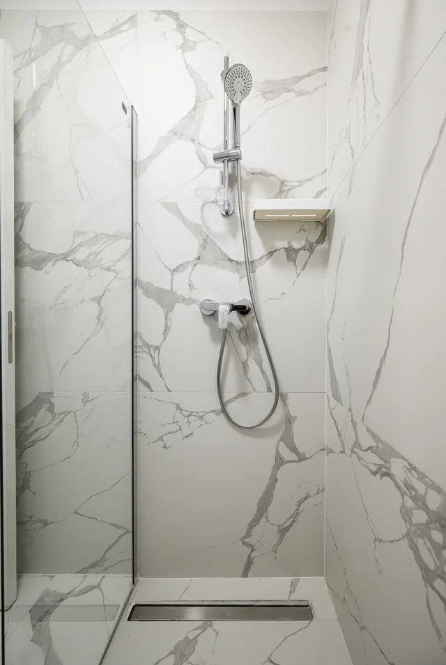 Glass shower enclosure