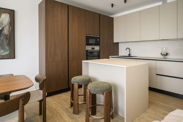 Kitchen island with two bar stools
