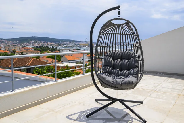 Hanging chair with views over the surrounding coast